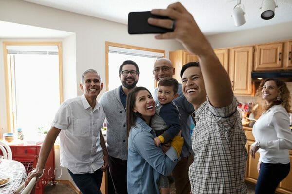 Family gathering in new home and taking a selfie